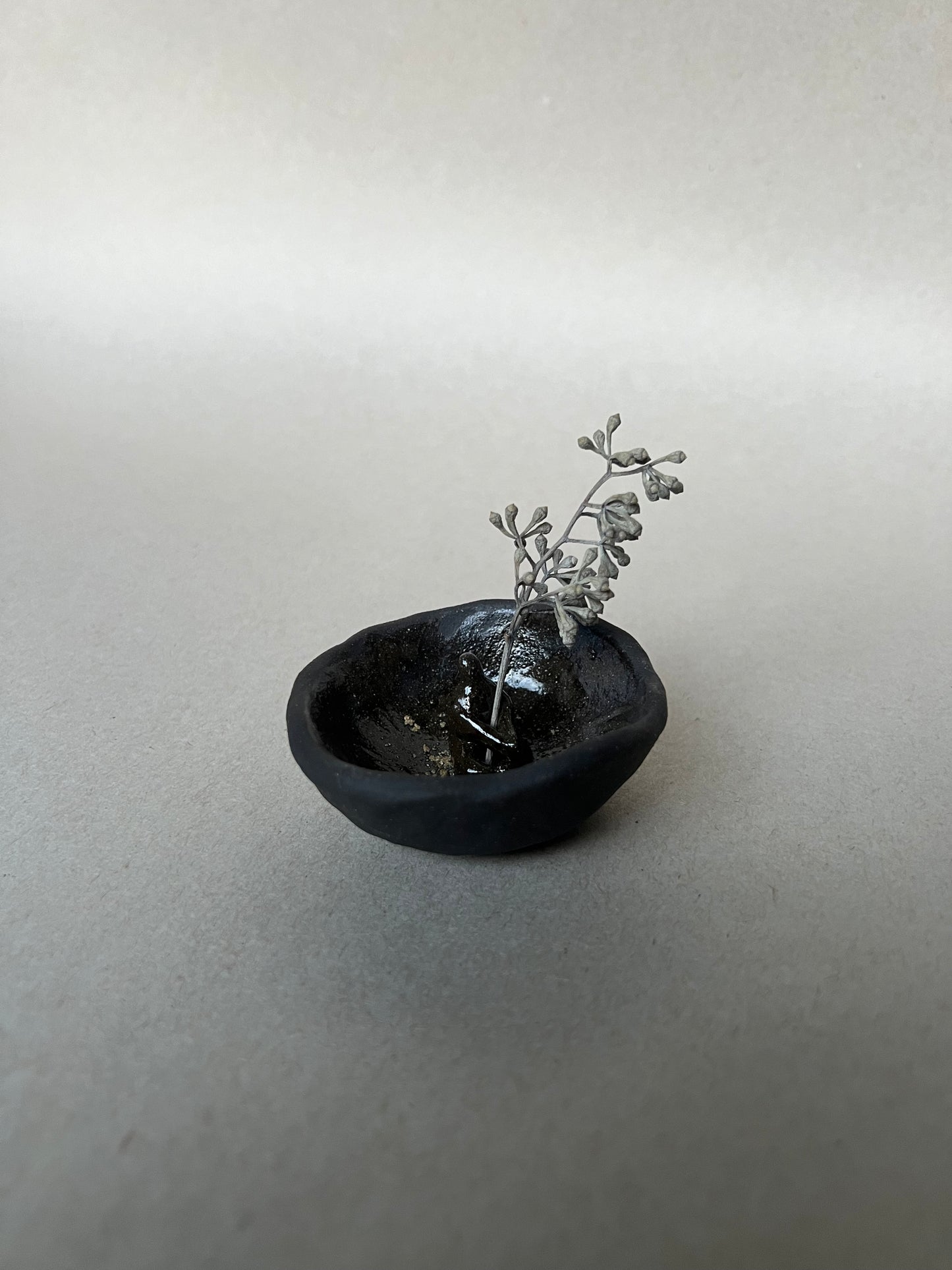 seated incense dish