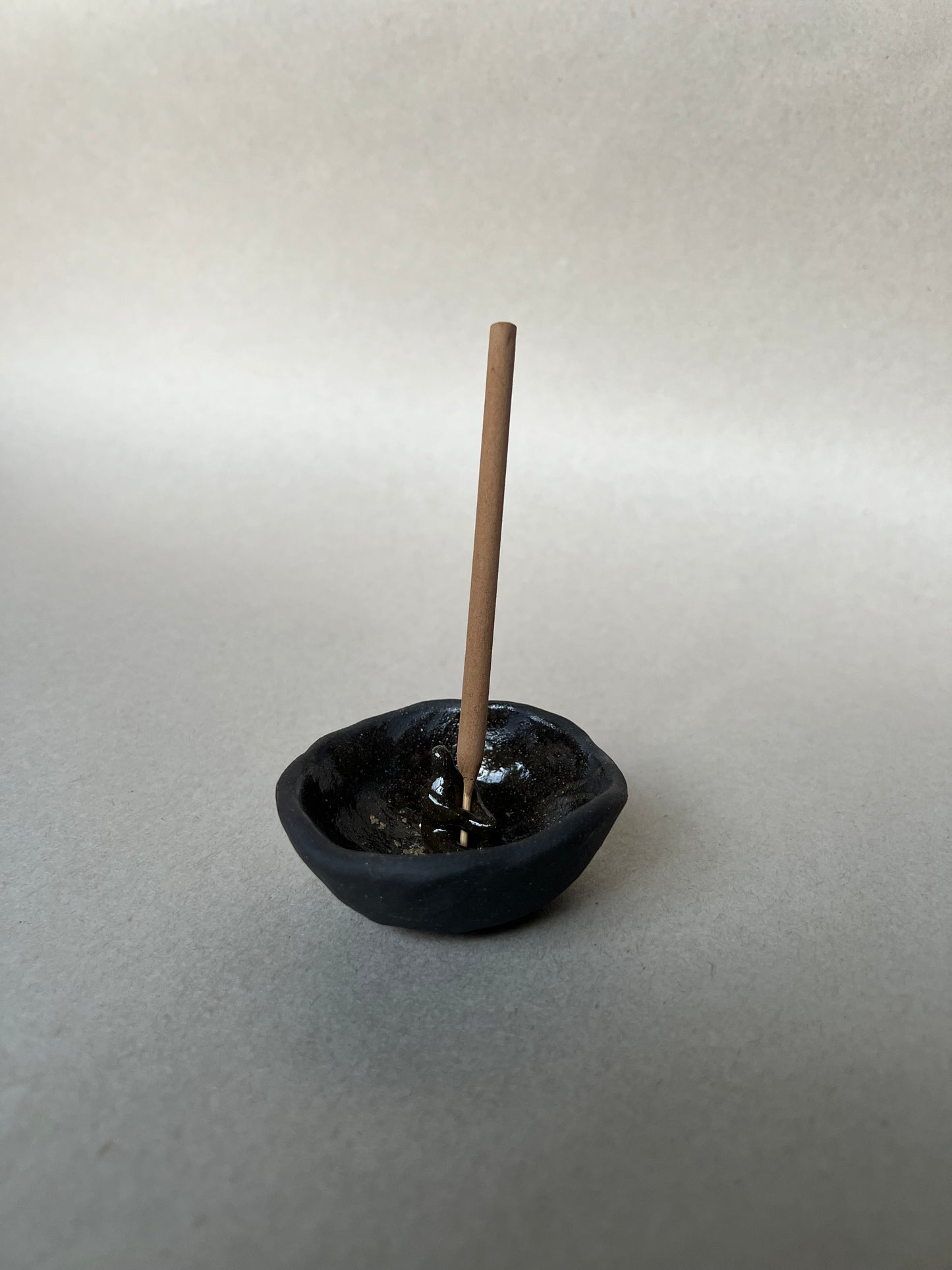 seated incense dish