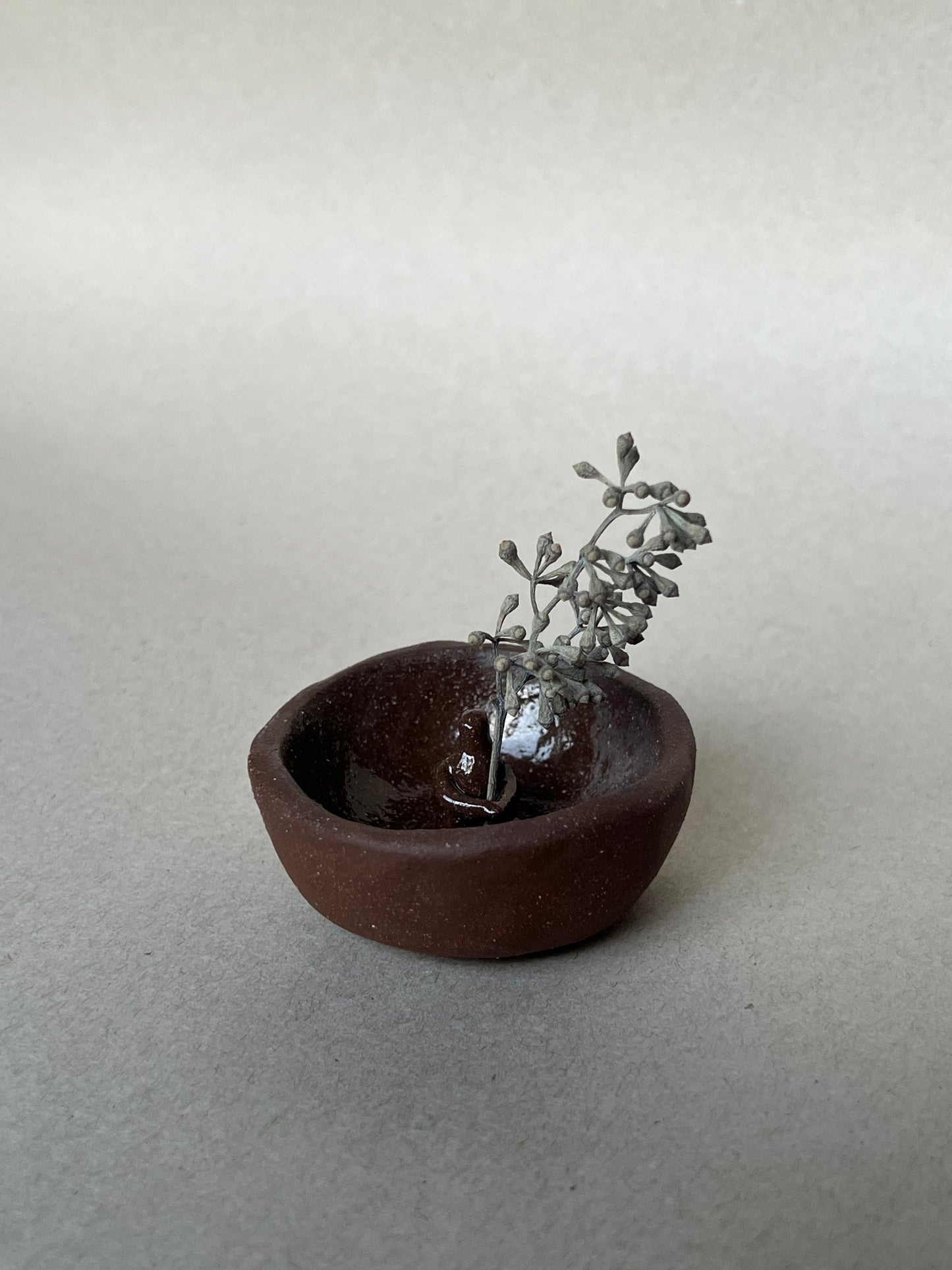 seated incense dish