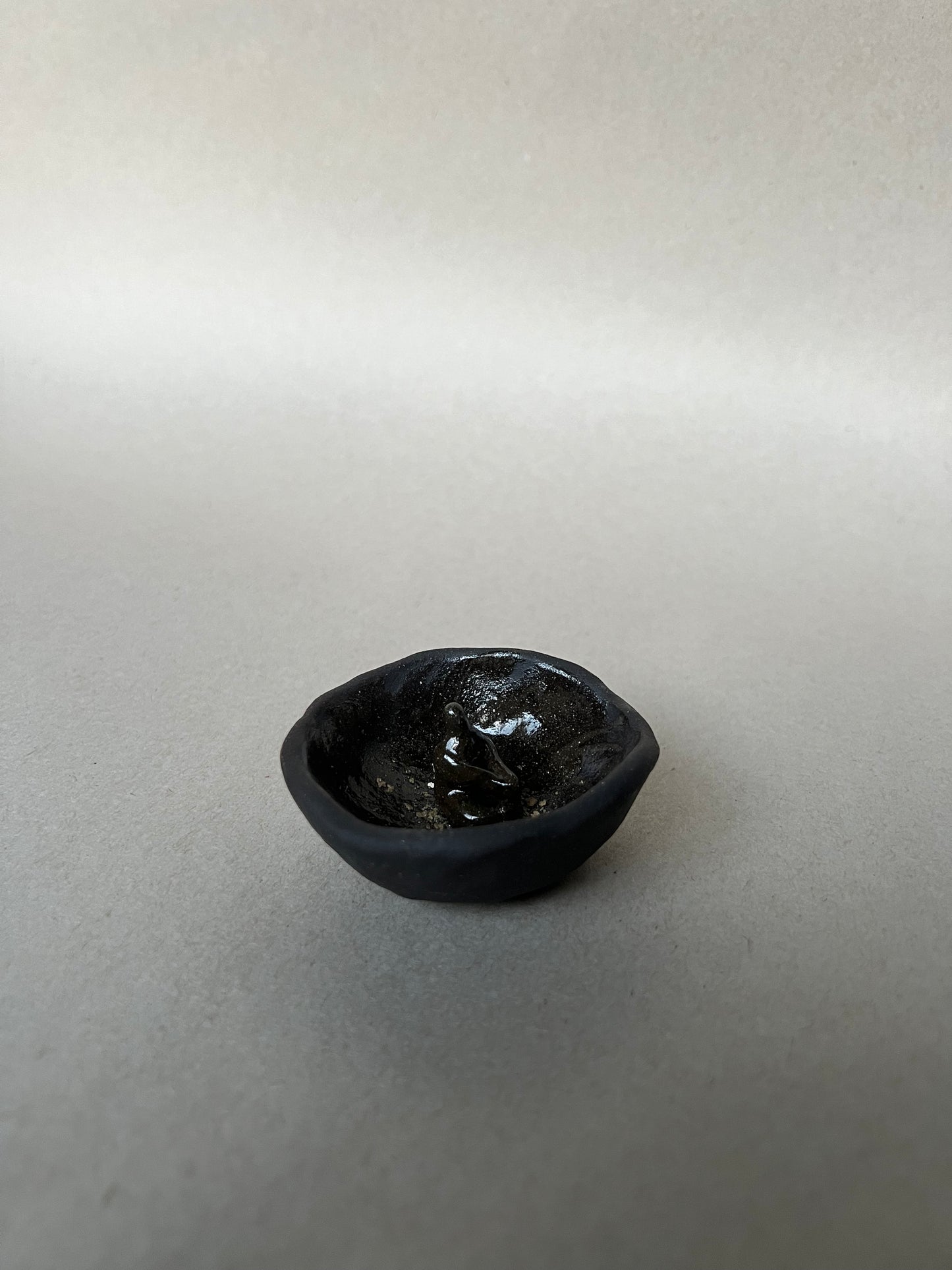 seated incense dish
